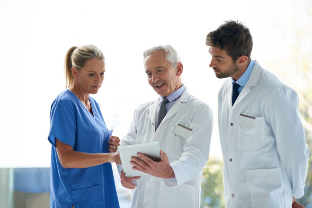istock Discussing a course of action to saving lives 905898534