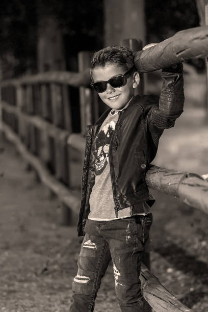 istock Confident little dandy on natural background 905899188