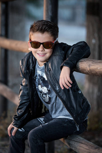 istock Adorable trendy kid in leather 905899228