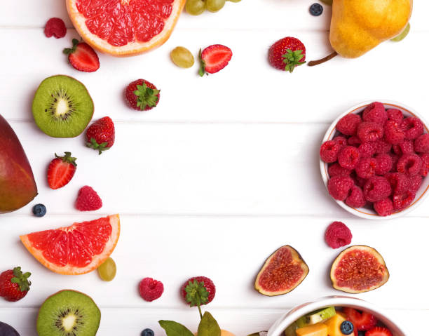 istock Fruits and berries on the white wooden background 905901518
