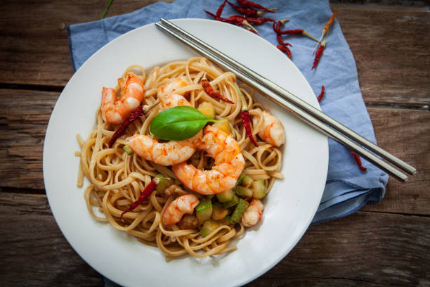 istock Thai noodles with shrimp 905908512