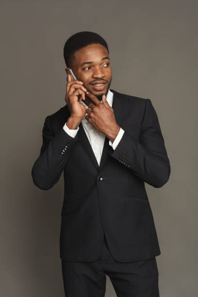 istock Handsome young black man portrait at studio background. 905910810