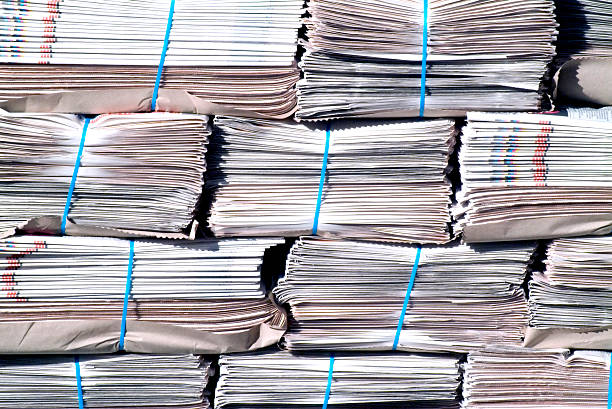 istock Background of stacks of newspapers 90591290