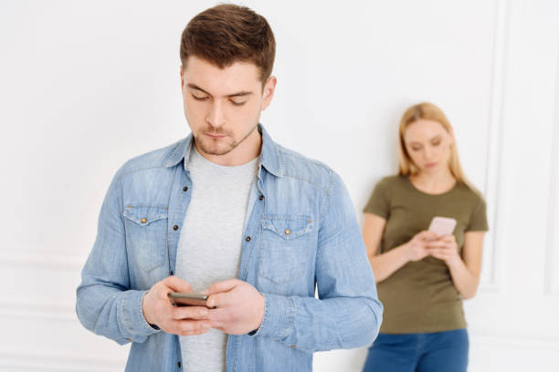 istock Sad young man chatting with his friends 905914752