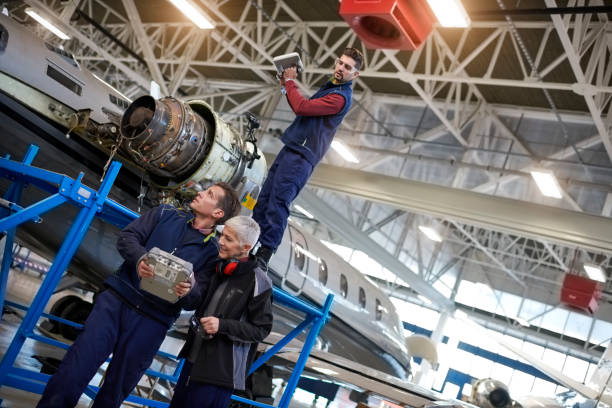 istock Aircraft mechanics in the hangar 905918258