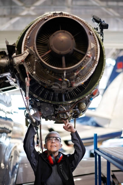 istock Aircraft mechanic in the hangar 905918352