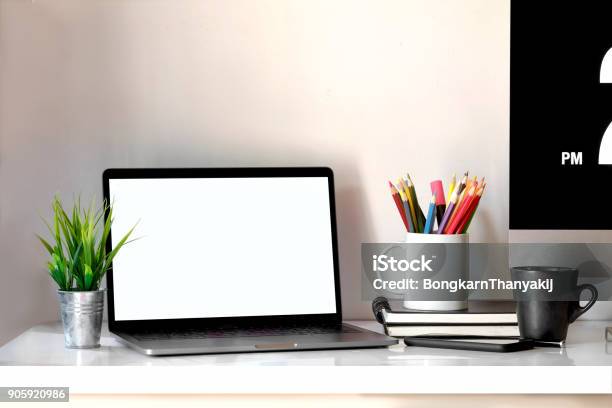 Stylish Workspace With Laptop Coffee Mug And Designer Or Office Supplies At Home Or Studio Mock Up Stock Photo - Download Image Now