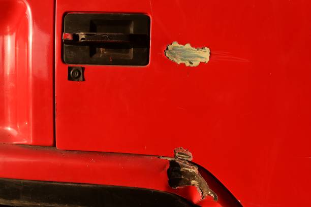 istock scratch on surface red door of truck 905921326