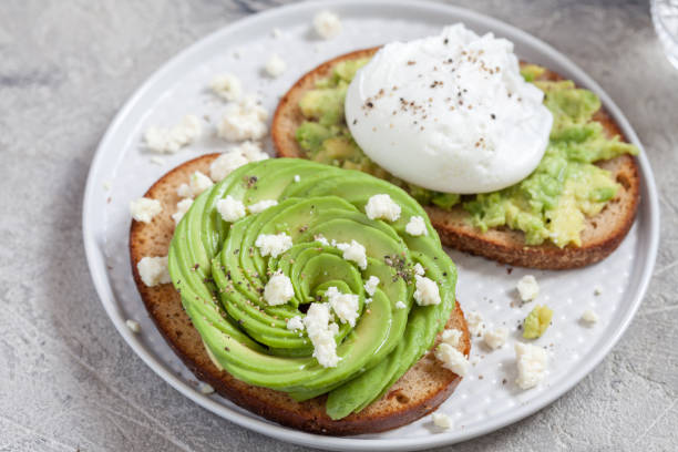 istock healthy breakfast toasts with avocado and egg 905925928