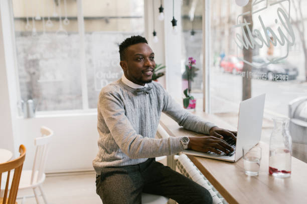 istock Young man working in the coffee bar 905927466