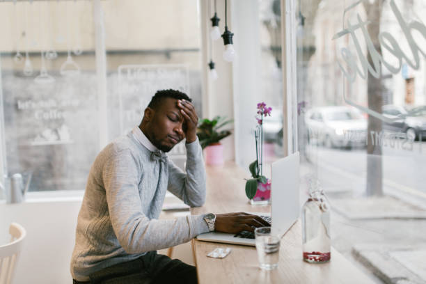 istock Young man working in the coffee bar 905929848