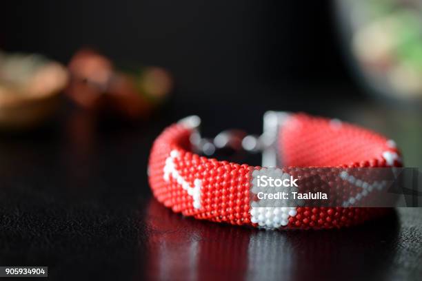 Red Beaded I Love You Bracelet On A Dark Background Close Up Stock Photo - Download Image Now