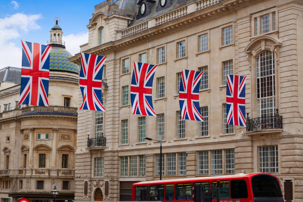 istock London Bus and UK flags in Piccadilly Circus 905935166