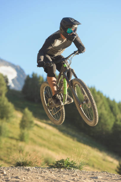 istock Male biker performing extreme stunts with mtb 905937598