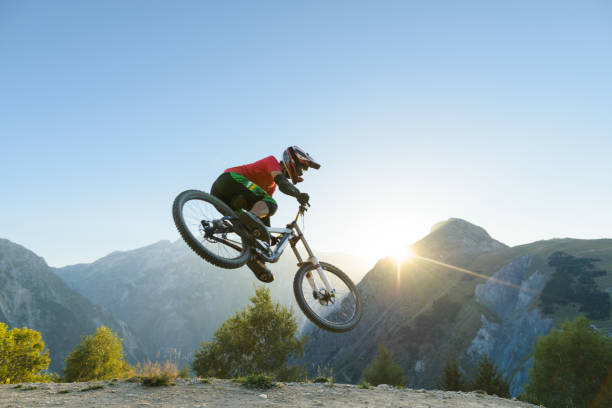 istock Man jumping in midair with dirt bike 905944332