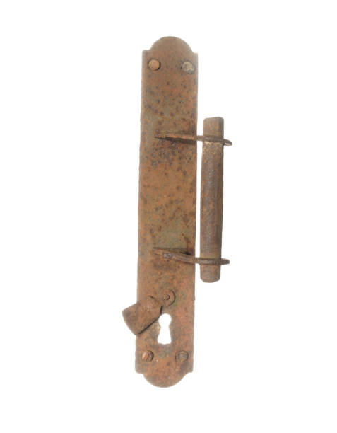 istock Old rusty door handle with keyhole isolated on white background. 905953760