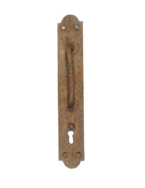 istock Old rusty door handle with keyhole isolated on white background. 905953928