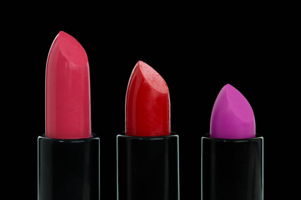 istock Colourful lipstick on isolated black background. Macro. Cut out. 905954132