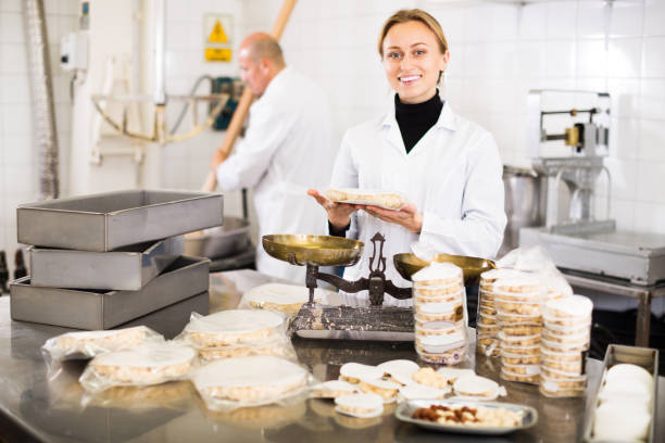 istock Worker standing near table in manufacture 905956372