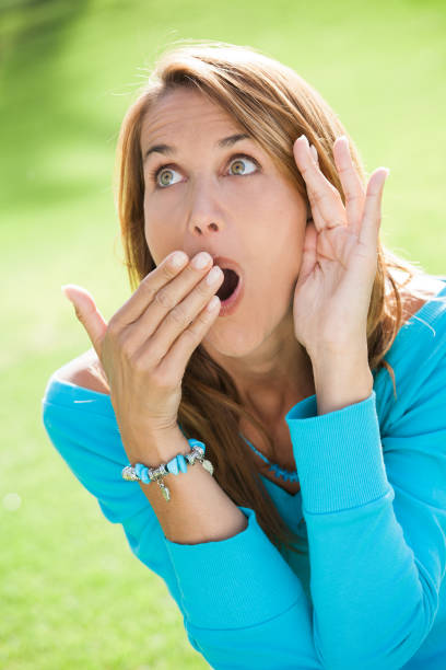 istock surprised woman in summer 905960416