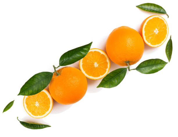 istock Halves and whole orange fruits. 905963282