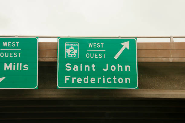 Road sign to Jasper and Lake Louise on road  in Jasper National Park
