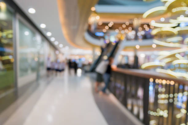 istock Abstract shopping mall store defocused blurred background 905969996