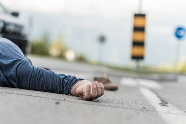 istock Traffic accident.Young man hit by a car 905971060