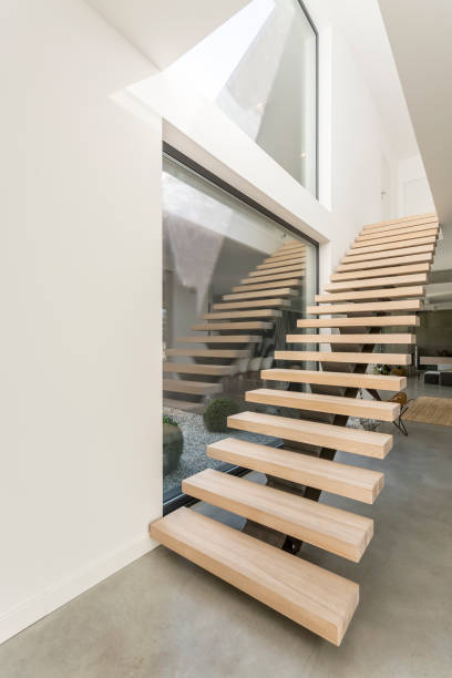 istock Spacious apartment with wooden stairs 905973760