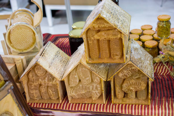 istock Fresh honey in the sealed comb frame 905975294