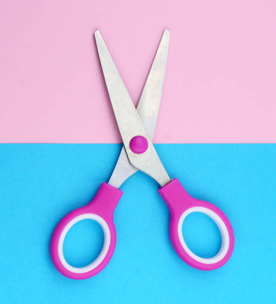 istock children's colorful scissors on a white background 905977392