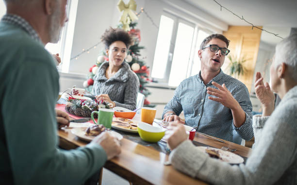 istock Family having breakfast on Christmas morning. 905993192