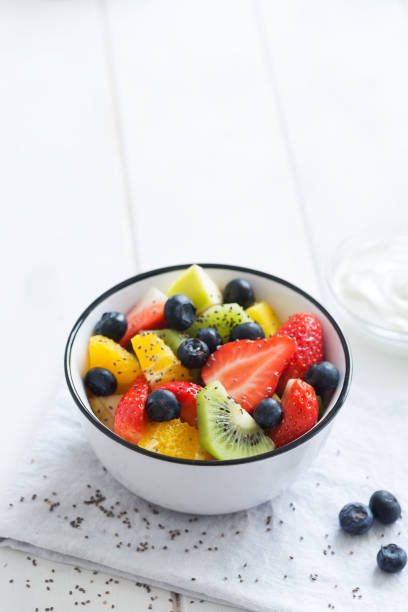 istock Fresh organic fruit salad with chia seeds. Copy space 905994004