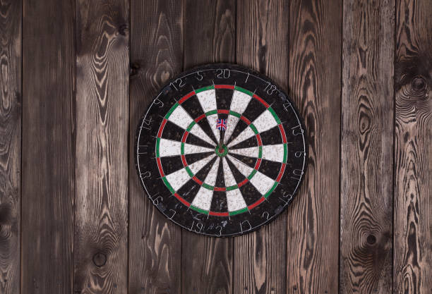 istock darts on a wooden wall 906014274