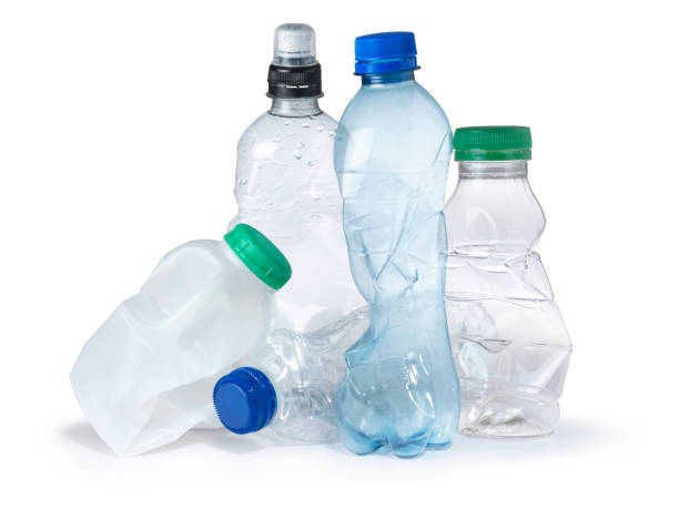 single use plastic bottle trash landfill shot of a group of plastic bottles crumpled and discarded ready for the trash and landfill. the image highlights the environmental issues with waste disposal. cut out on a white background with copy space for the designer garbage dump photos stock pictures, royalty-free photos & images