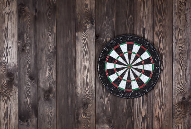 istock darts on a wooden wall 906017026