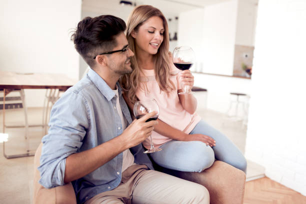 istock Young couple relaxing in their apartment 906019908