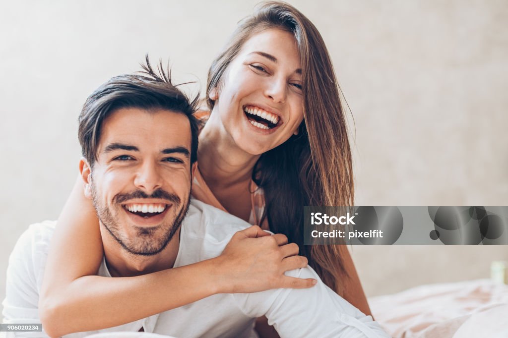 Happy love Close-up of a happy young couple Smiling Stock Photo