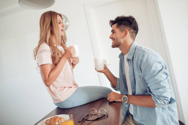 istock Young couple relaxing in their apartment 906020356