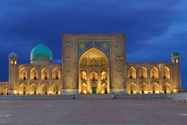 Madrassa in Registan Square at the twilight, Samarkand, Uzbekistan.
