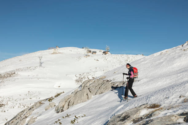 istock Steep decsent with snowshoes at Dachstein Mountains, Austria. 906022152