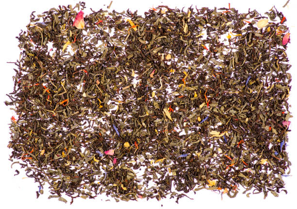 istock Leaf tea with flowers and fruits 906022344