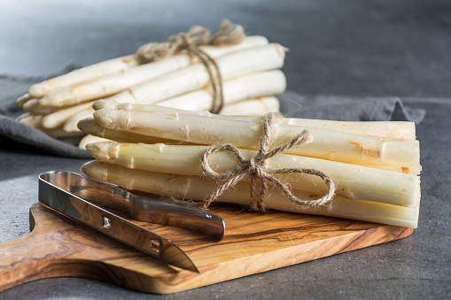 Spring season, new harvest of Dutch, German white asparagus, bunch of raw white asparagus