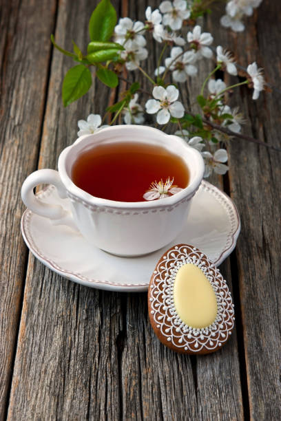 istock Easter composition with tea cup and homemade cookies 906026282