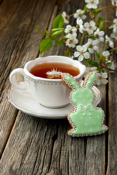 istock Easter composition with tea cup and homemade cookies 906026322