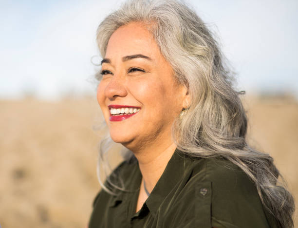 istock Senior Mexican Woman at the Beach 906026482