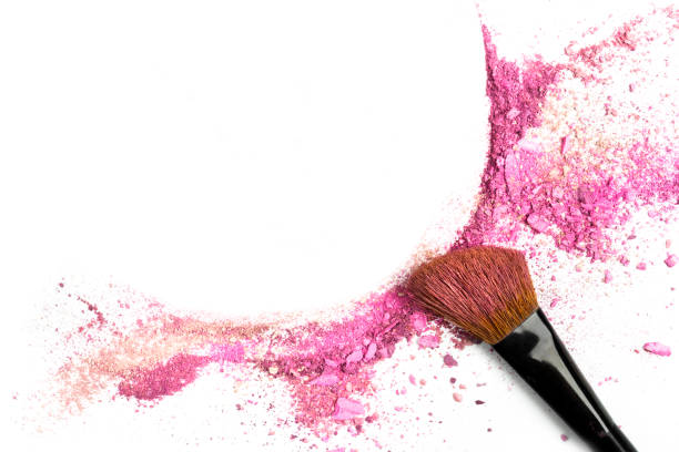 Powder and blush forming frame, with makeup brush Traces of vibrant pink powder and blush forming a frame, with a makeup brush. A square template for a makeup artist's business card or flyer design, with copy space make up brush photos stock pictures, royalty-free photos & images