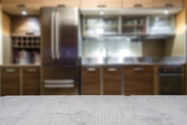 istock Empty wooden table and modern kitchen background , ready for product montage 906037276