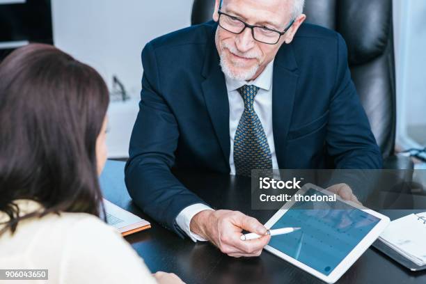 Woman Meeting Financial Adviser In Office Stock Photo - Download Image Now - Financial Advisor, Customer, Bank Manager