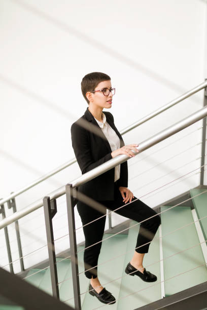 istock Company CEO busy walking in office 906045630